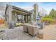 Backyard deck featuring outdoor furniture and a grill at 19080 E Low Cir, Aurora, CO 80015
