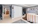 Bedroom with decor, closet, and view to another room at 19080 E Low Cir, Aurora, CO 80015