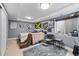 Cozy bedroom showcasing a cushioned chair and decor at 19080 E Low Cir, Aurora, CO 80015