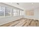 Bright room with lots of light, light hardwood floors and neutral walls at 4729 N Meade St, Denver, CO 80211