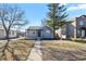 Charming single-story home with a well-maintained front yard and 'For Sale' sign at 4729 N Meade St, Denver, CO 80211