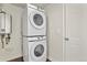 Convenient laundry room with stacked washer and dryer for efficient use of space at 4729 N Meade St, Denver, CO 80211