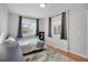 Cozy bedroom with warm wood floors and gray accents at 1927 Kenton St, Aurora, CO 80010