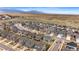 Panoramic aerial shot of a community highlighting the homes, landscape, and scenic views of the surrounding terrain at 17748 W 95Th Ave, Arvada, CO 80007