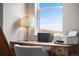Home office space with a wooden desk, natural light and a printer for at-home work at 17748 W 95Th Ave, Arvada, CO 80007