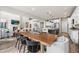 Spacious open concept layout combining living, dining, and kitchen areas, perfect for entertaining at 17748 W 95Th Ave, Arvada, CO 80007