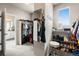 Organized walk-in closet with shelves and rods, providing ample storage and access to the Primary bathroom at 17748 W 95Th Ave, Arvada, CO 80007