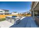 Spacious backyard featuring a built-in outdoor kitchen area and a patio at 6255 Kenzie Cir, Castle Pines, CO 80108