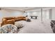 Spacious basement features carpeted floors, a large sectional sofa and plenty of room for activities at 6255 Kenzie Cir, Castle Pines, CO 80108