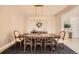 Dining room featuring a modern chandelier and decorative table setting at 6255 Kenzie Cir, Castle Pines, CO 80108