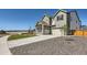 Well-maintained home with a two-car garage, tidy landscaping and mountain views at 6255 Kenzie Cir, Castle Pines, CO 80108
