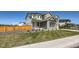 Charming front yard with well-maintained lawn and attractive landscaping at 6255 Kenzie Cir, Castle Pines, CO 80108