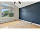 Bedroom featuring high ceilings, natural light, and wood flooring at 1280 W 134Th Pl, Westminster, CO 80234