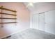 Bedroom featuring neutral carpet, paint and a large closet at 1280 W 134Th Pl, Westminster, CO 80234