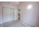 Bedroom with paint walls and plush carpet, featuring a sliding door closet at 1280 W 134Th Pl, Westminster, CO 80234