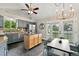 Modern kitchen with stainless steel appliances, granite countertops, and a center island at 1280 W 134Th Pl, Westminster, CO 80234