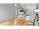 Bright living room with hardwood floors, vaulted ceilings, and an open floor plan at 1280 W 134Th Pl, Westminster, CO 80234