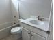 Bright bathroom with a white vanity, modern fixtures, and a combined bathtub and shower at 1713 Jennifer St, Brighton, CO 80601