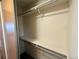 A well-organized closet with shelving and a hanging rod for storage at 10716 Foxwood Ct, Parker, CO 80138