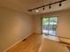 Dining room featuring hardwood floors and a sliding glass door at 10716 Foxwood Ct, Parker, CO 80138