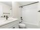Modern bathroom featuring a bathtub and shower with black fixtures at 5970 S Platte Canyon Dr, Littleton, CO 80123