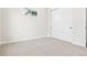 Minimalist bedroom with closet and neutral carpet, offering a clean and spacious feel at 5970 S Platte Canyon Dr, Littleton, CO 80123