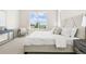 Bedroom with a large window allowing an abundance of natural light with bedside table at 5970 S Platte Canyon Dr, Littleton, CO 80123