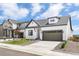 Charming two-story home with a stylish exterior, well-maintained lawn, and inviting curb appeal at 5970 S Platte Canyon Dr, Littleton, CO 80123