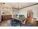 Formal dining area features hardwood flooring, updated lighting and stylish finishes at 12570 W 60Th Ave, Arvada, CO 80004