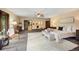 Expansive main bedroom features a ceiling fan, hardwood floors and large windows at 12570 W 60Th Ave, Arvada, CO 80004