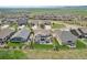 Aerial view showcasing the home's backyard, patio, and the surrounding neighborhood at 8803 Antero Ct, Arvada, CO 80007