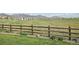 Beautiful backyard featuring a wooden fence with a mountain view in the background at 8803 Antero Ct, Arvada, CO 80007