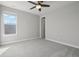 A modern bedroom with large windows that fills the room with natural light at 8803 Antero Ct, Arvada, CO 80007