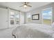 Bright bedroom with mountain views through a double set of windows at 8803 Antero Ct, Arvada, CO 80007