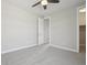 Neutral bedroom with doorway to the closet and view of ceiling fan at 8803 Antero Ct, Arvada, CO 80007