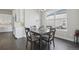 Cozy dining room with modern table, natural light, and elegant decor at 8803 Antero Ct, Arvada, CO 80007