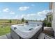 Inviting hot tub on a patio with a serene view of the surrounding landscape at 8803 Antero Ct, Arvada, CO 80007