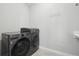 A well-equipped laundry room with modern washer and dryer at 8803 Antero Ct, Arvada, CO 80007