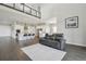 Bright, open living space with a second-story loft overlooking the modern kitchen at 8803 Antero Ct, Arvada, CO 80007