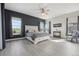 Spacious main bedroom with ample natural light, ceiling fan, and luxurious decor at 8803 Antero Ct, Arvada, CO 80007