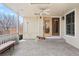 Covered patio with stamped concrete flooring and ceiling fan at 7558 S Ivanhoe Cir, Centennial, CO 80112