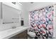 This bathroom is equipped with a modern vanity, sink, and toilet at 12119 Forest St, Thornton, CO 80241
