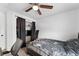 Bedroom with a ceiling fan and closet for clothing storage at 12119 Forest St, Thornton, CO 80241