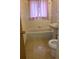 Clean bathroom with classic fixtures and bright lighting at 451 Lansing St, Aurora, CO 80010