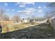 Large backyard with grassy area and partial wooden fence at 7447 Quay St, Arvada, CO 80003