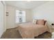 Cozy bedroom with a double bed and carpeted floors at 7447 Quay St, Arvada, CO 80003