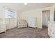 Well-lit bedroom with carpeted floors and neutral tones at 7447 Quay St, Arvada, CO 80003