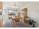 Bright dining area with a wooden table and access to backyard at 7447 Quay St, Arvada, CO 80003