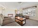 Living room with a cozy seating area and wood accents at 7447 Quay St, Arvada, CO 80003