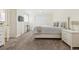 Spacious main bedroom with carpeted floors and ample closet space at 7447 Quay St, Arvada, CO 80003